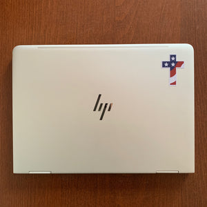 Cross sticker embellished with waving American flag